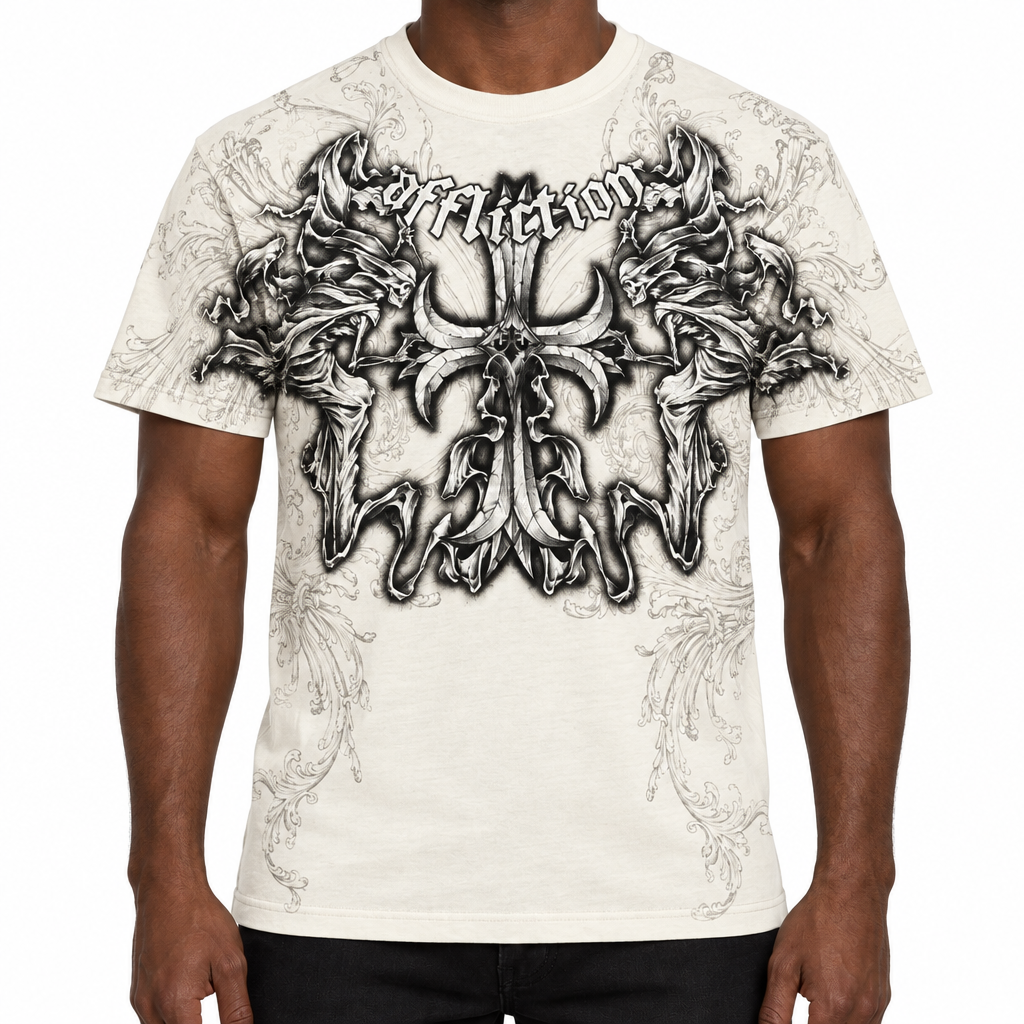 Cream graphic tee on a darker-skinned model, with no face in frame and a white background